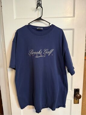 Brooks Golf navy blue heavyweight tee with gold and white embroidery. Size XL